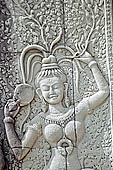 Angkor Wat temple, the fourth enclosure, the bas reliefs of the west gopura, superbly preserved devatas, either individually or in groups of two or three, amongst the finest in the monument. 